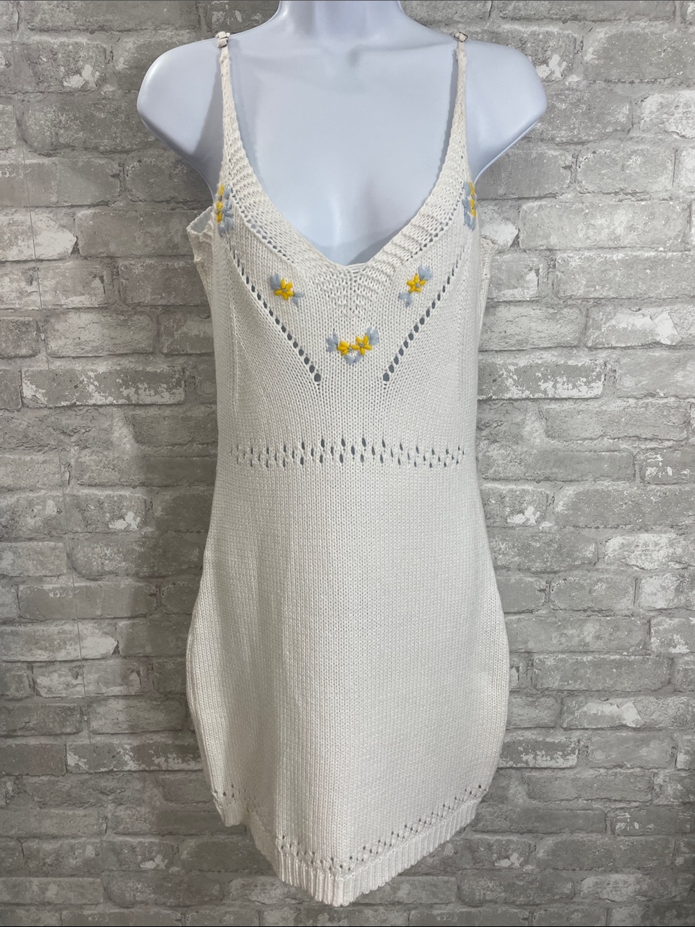 Vici knit dress featuring delicate yellow and blue floral embroidery